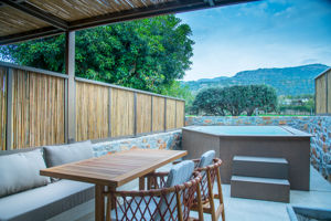 Woonvoorbeeld standaardkamer tuinzicht en bubbelbad