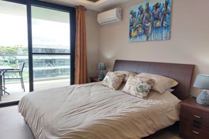 Woonvoorbeeld 2-kamerappartement staandaard, tuin- of zwembadzicht