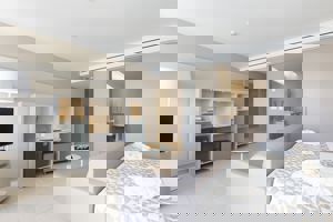 Woonvoorbeeld junior suite zwembadzicht