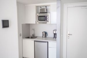 Woonvoorbeeld familiekamer suite zeezicht & gedeeltelijk zeezicht