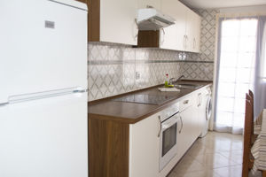 Woonvoorbeeld 2-kamerappartement met zwembadzicht