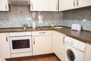 Woonvoorbeeld 3-kamerappartement (family) met zwembadzicht