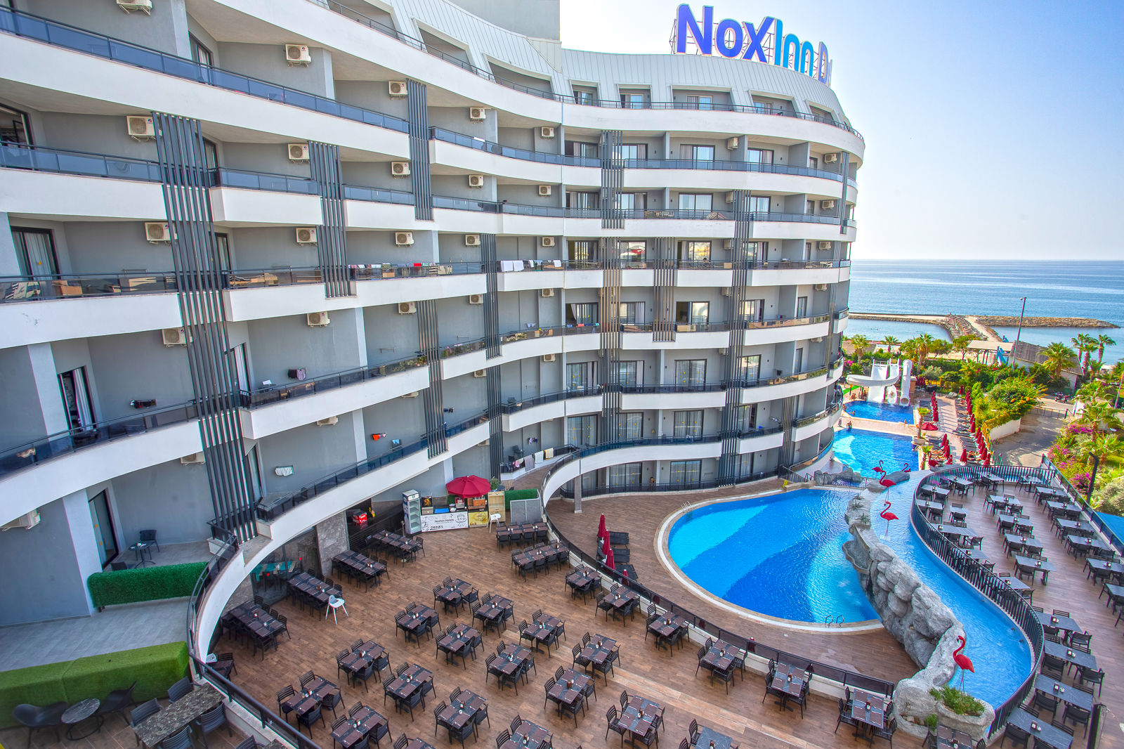 Noxinn Deluxe Hotel slide 4