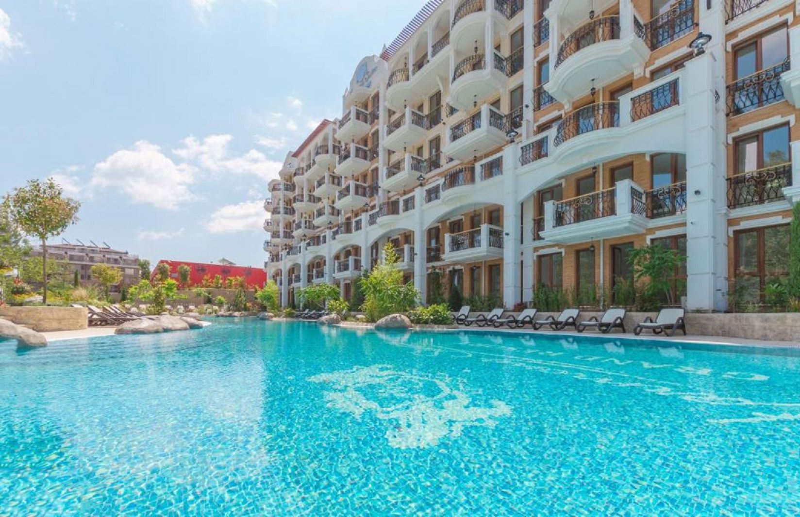 Harmony Suites Grand Resort slide 2