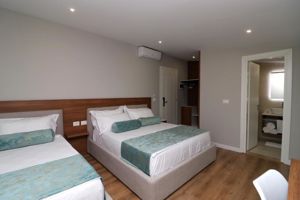 Woonvoorbeeld Familiekamer met bergzicht