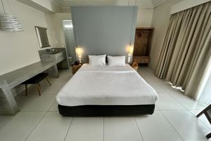 Woonvoorbeeld 2-kamerappartement Superior met zwembadzicht