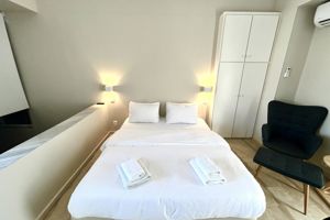 Woonvoorbeeld 2-kamerappartement Master met zwembad- of tuinzicht