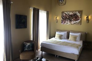 Woonvoorbeeld Suite Type 2 Florine, tuin- en zeezicht