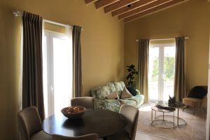 Woonvoorbeeld Suite Type 2 Florine, tuin- en zeezicht