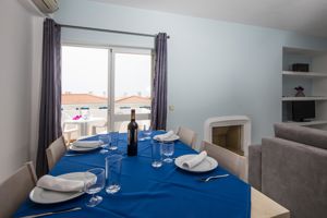 Woonvoorbeeld 2- of 3-kamerappartement (zwembadzicht)