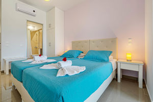 Woonvoorbeeld Comfort by the pool kamer